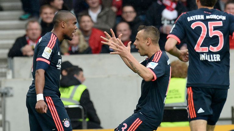 Bayern Munich's Douglas Costa (L) celebrates his goal with fellow Brazilian Rafinha 