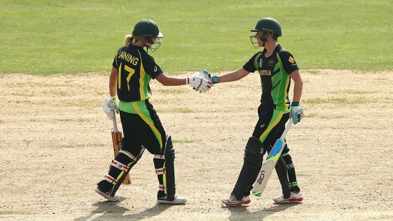 Elyse Villani is congratulated by Meg Lanning after reaching her half century