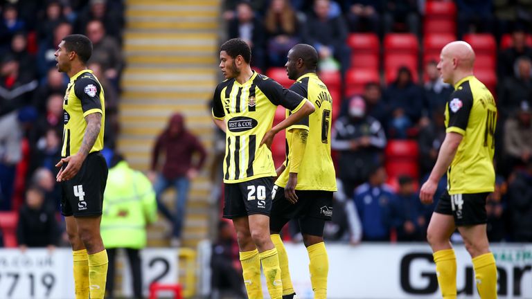 Dagenham and Redbridge players look dejected after relegation to National League