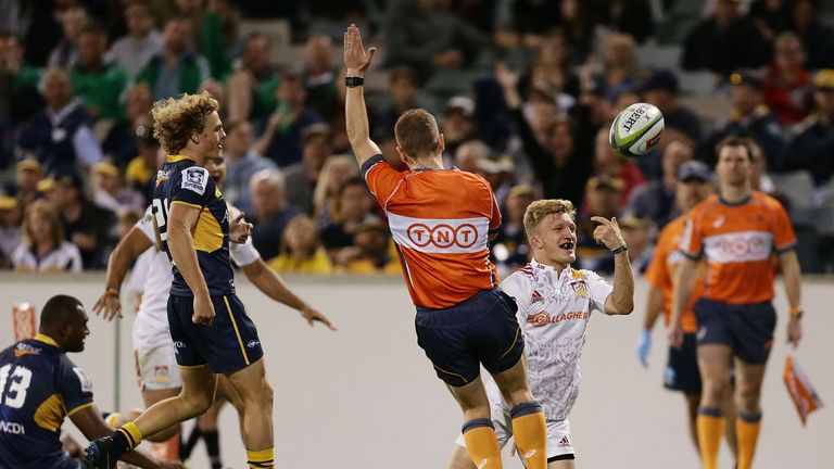 CANBERRA, AUSTRALIA - APRIL 02:  Damian McKenzie of the Chiefs celebrates scoring a try during the round six Super Rugby match between the Brumbies and the