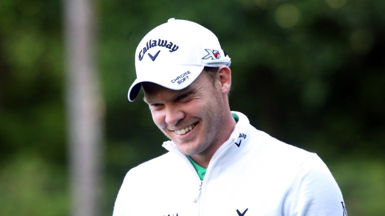 Danny Willett of England reacts to his birdie on the 13th green during the final round of the 2016 Masters Tournament at Augusta