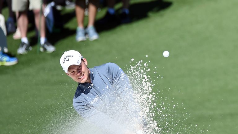 Danny Willett of England plays a shot from a bunker on the second hole during the second round of the 2016 Masters Tournament at Augusta National Golf Club