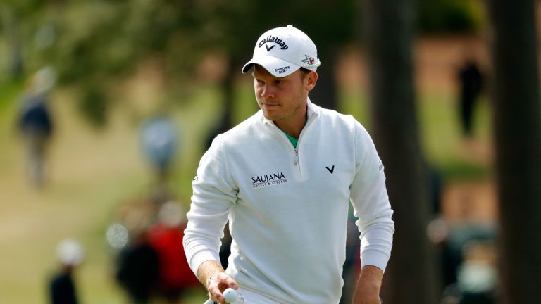 Danny Willett of England reacts on the seventh green during the final round