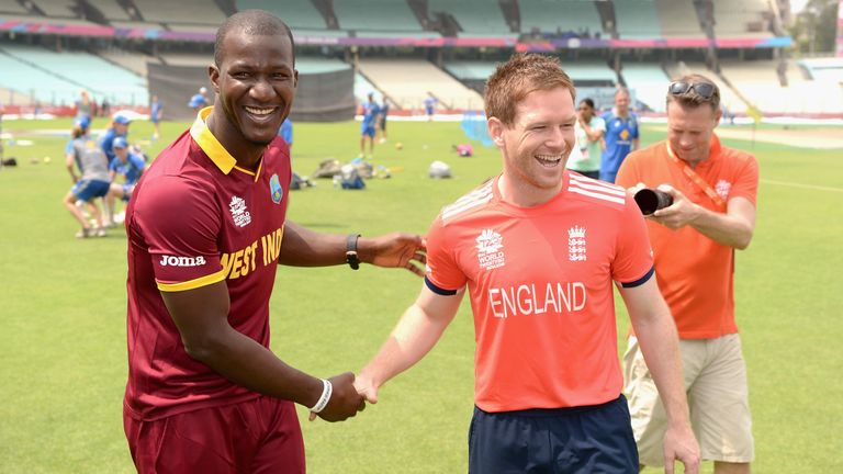 Darren Sammy and England captain Eoin Morgan share a joke 