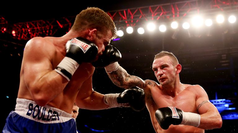 GLASGOW, SCOTLAND - MAY 11:  Gary Boulden (L) in action with David Brophy during their Middleweight bout bout at Emirates Arena on May 11, 2013 in Glasgow,