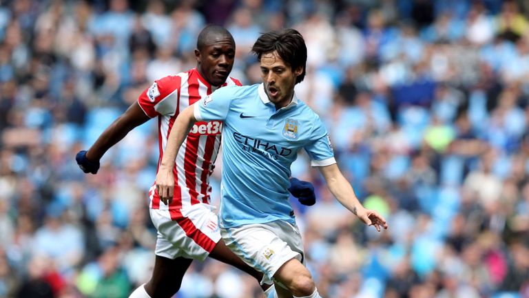 Stoke City's Giannelli Imbula and Manchester City's David Silva (right) during the Barclays Premier League match at the Etihad Stadium, Manchester. PRESS A