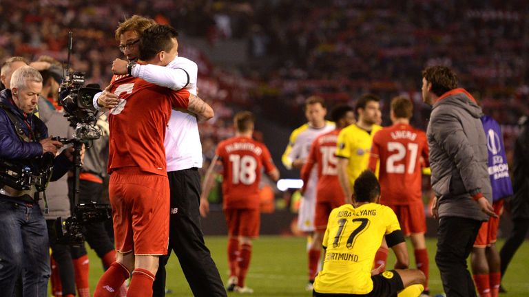 Dejan Lovren celebrates with Jurgen Klopp 