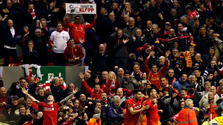 Liverpool's Dejan Lovren celebrates scoring his side's fourth goal 