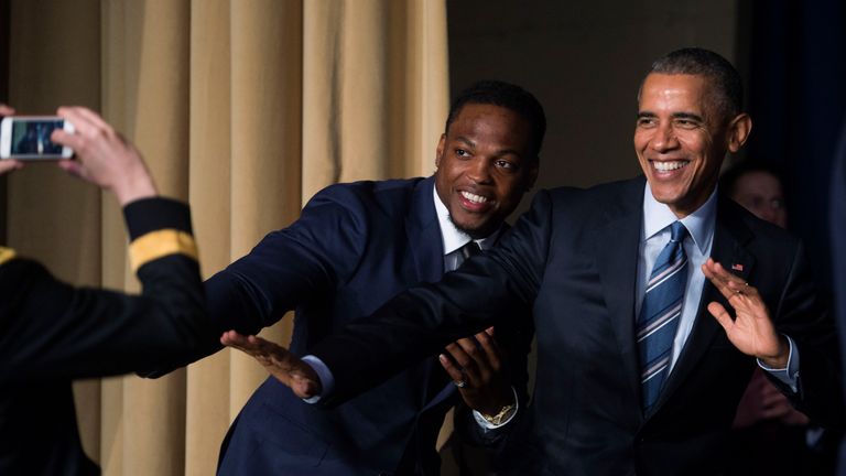 President Barack Obama strikes the Heisman pose with Heisman Trophy winner Derrick Henry at the conclusion of the Nation