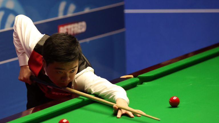 Ding Junhui in action against Martin Gould 