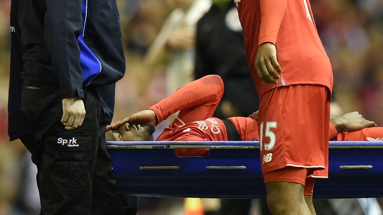 Liverpool's English striker Daniel Sturridge (R) looks at Liverpool's Belgian striker Divock Origi as he is