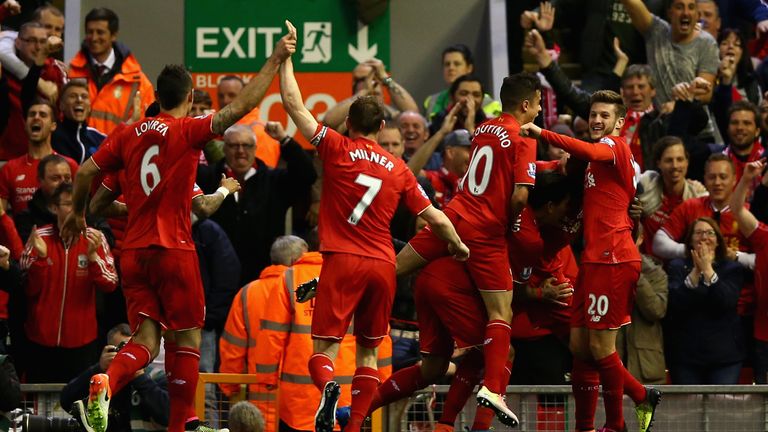 Liverpool players celebrate following Divock Origi's opening goal