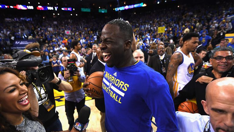 Draymond Green celebrates after the Golden State Warriors win a record 73rd game of the season