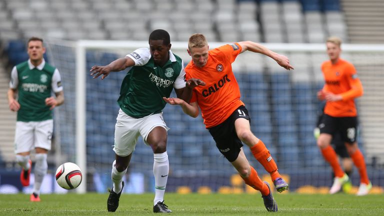 Hibernian midfielder Marvin Bartley competes with Dundee United's Chris Erskine
