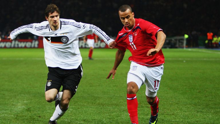 BERLIN - NOVEMBER 19: Arne Friedrich (L) of Germany challenges Gabriel Agbonlahor of England during the International Friendly match between Germany and En
