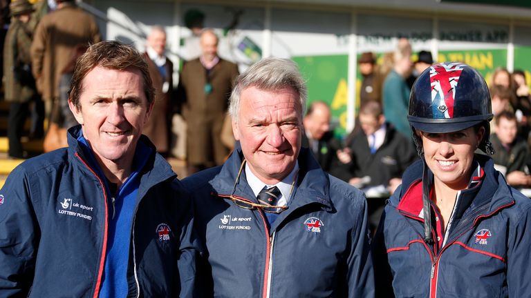 CHELTENHAM, ENGLAND - NOVEMBER 13: L-R, Tony McCoy, Yogi Breisner and Charlotte Dujardin after a dressage demonstration  at Cheltenham racecourse 