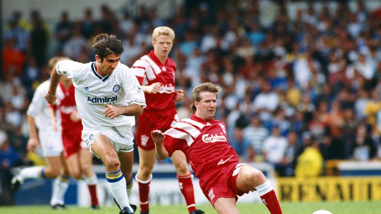 Leeds United forward Eric Cantona ( left) is beaten to the ball by Ronnie Whelan during the FA Premier League match