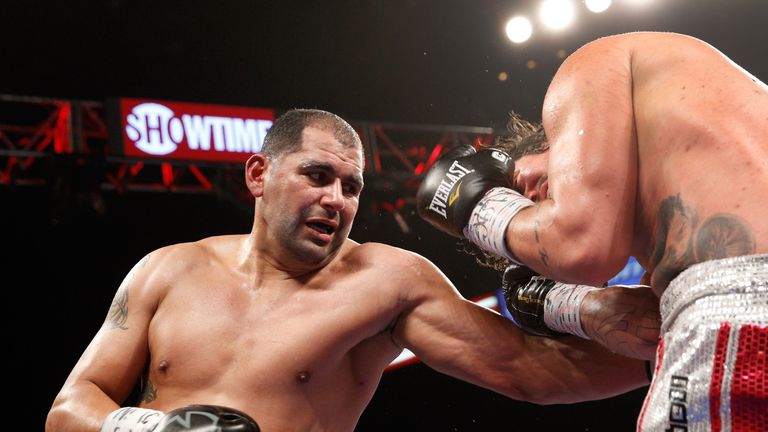 LAS VEGAS, NV - JANUARY 17:  Eric Molina lands a punch on Raphael Zumbano during a heavyweight fight at the MGM Grand Garden Arena on January 17, 2015 in L