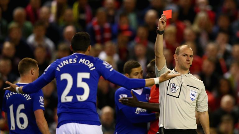 Ramiro Funes Mori of Everton receives a red card during the Merseyside derby.