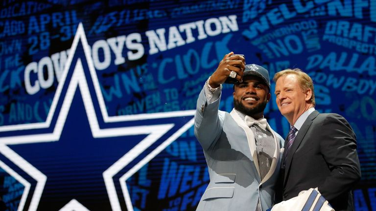 Ezekiel Elliott of Ohio State poses with NFL Commissioner Roger Goodell after being picked #4 overall by the Dallas Cowboys 