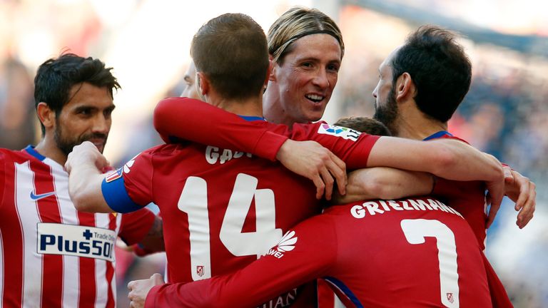 Fernando Torres celebrates his goal for Atletico Madrid
