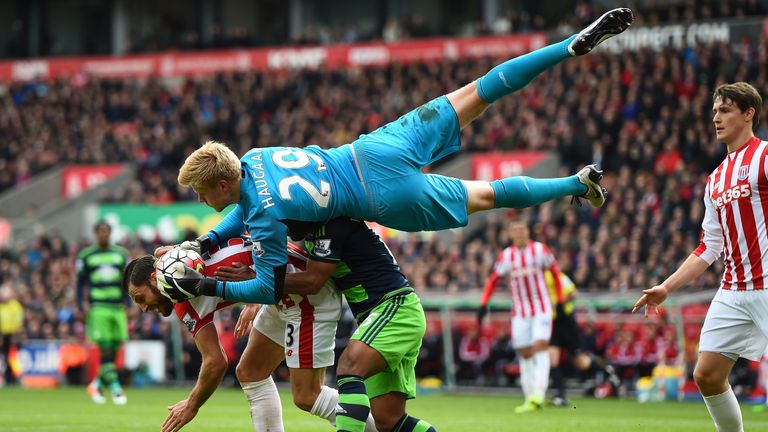 Jakob Haugaard makes a save during the match between Stoke City and Swansea City 