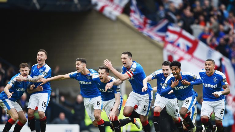 Rangers players celebrate after beating Celtic in a penalty shoot out during the William Hill Scottish Cup semi final