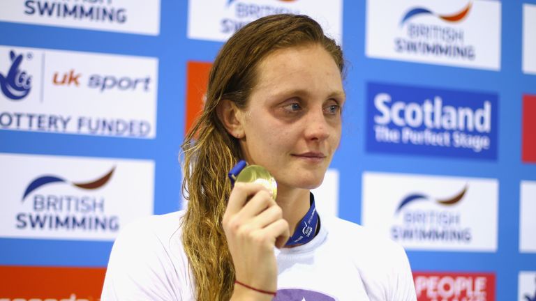 GLASGOW, SCOTLAND - APRIL 14:  Francesca Halsall of Great Britain looks on with her Gold Medal after winning the Women's 50m Freestyle Final on day three o