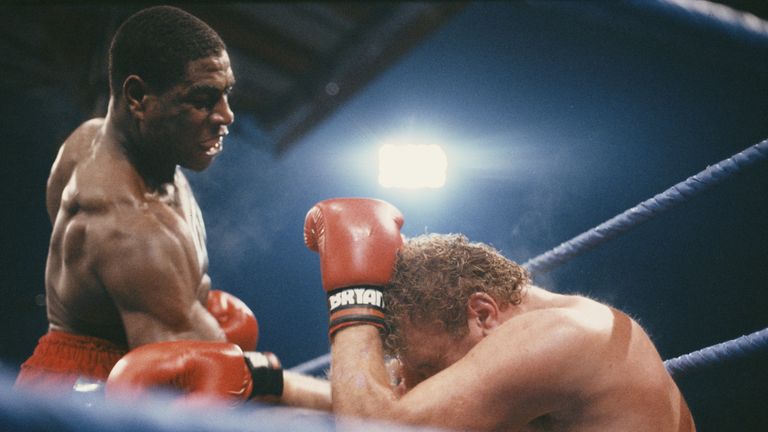 Frank Bruno (left) on the attack in the 8th round during his fight against Joe Bugner on 24th October 1987 at White Hart Lane, London, Gr