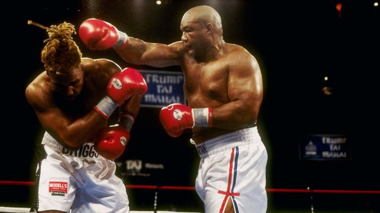 George Foreman (R) reigned twice as world champion