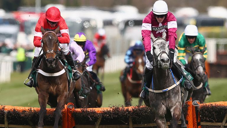 Noel Fehily (L) riding Buveur D'Air clears the last on his way to victory from David Mullins (R) riding Petit Mouchoir in t
