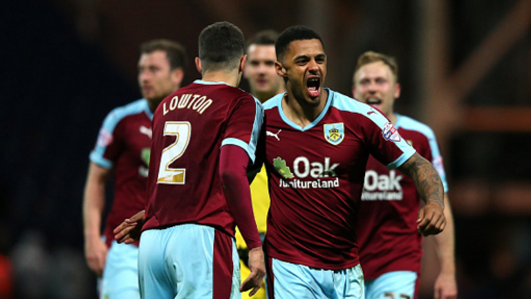 Andre Gray cheers after Burnley's early opener at Deepdale