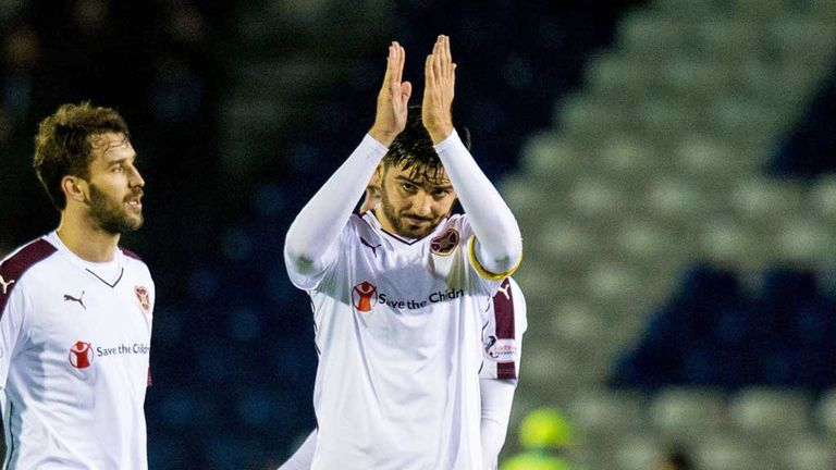 Hearts' Alim Ozturk applauds fans at Inverness