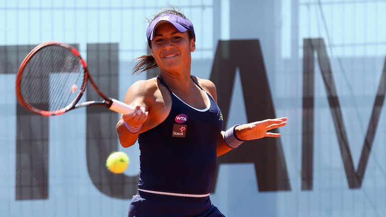 MADRID, SPAIN - APRIL 30:  Heather Watson of Great Britain plays a forehand against Mirjana Lucic-Baroni of Croatia