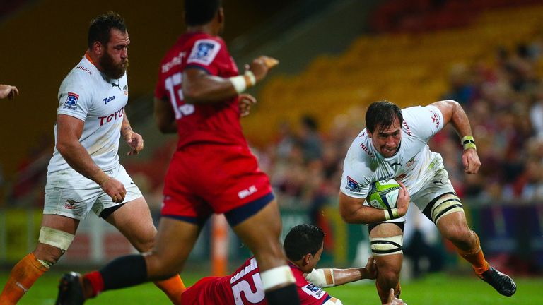 Henco Venter beats the tackle of Anthony Fainga.