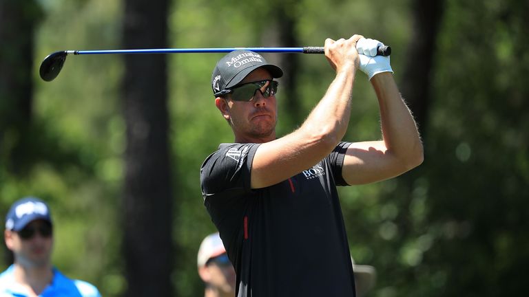 Henrik Stenson of Sweden hits his tee shot on the fifth hole during the final round of the Shell Houston Open