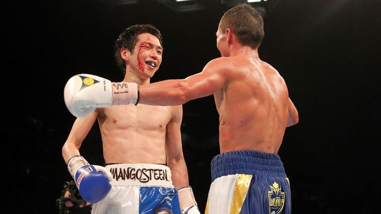 Hisashi Amagasa and Josh Warrington embrace afterwards