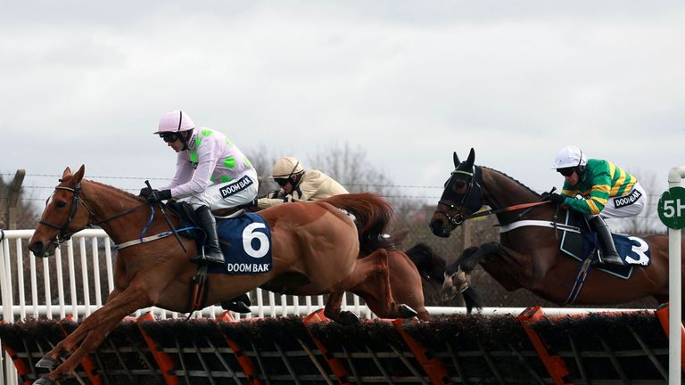 Annie Power ridden by Ruby Walsh (left) on the way to winning the Doom Bar Aintree Hurdle during the Grand Opening Day of the Crabbie's Grand National Fest