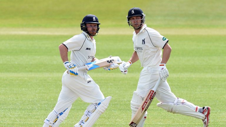 Warwickshire's Ian Bell (l) and Jonathan Trott in action against Hampshire in the County Championship
