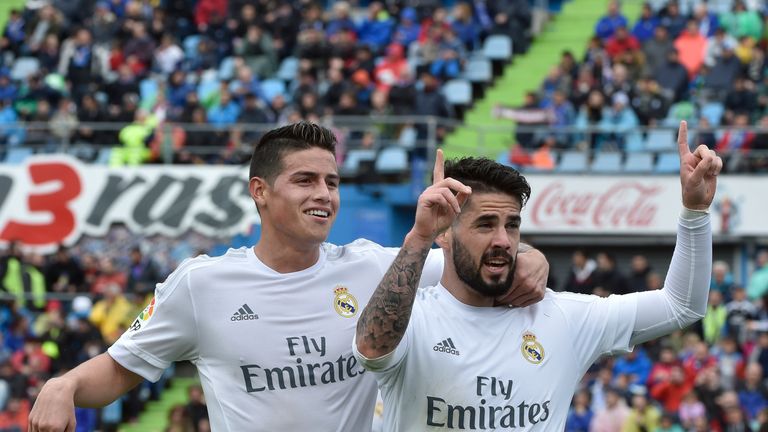 Real Madrid midfielder Isco celebrates with James Rodriguez 