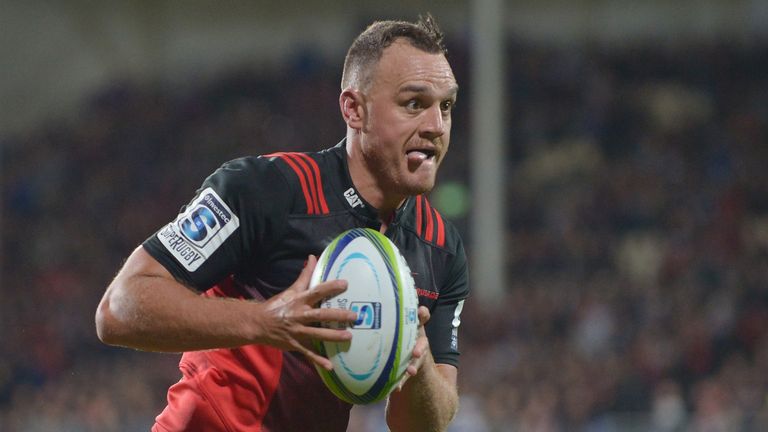 Israel Dagg of the Crusaders runs through to score a try during the round eight Super Rugby match between the Crusaders and the Jaguares