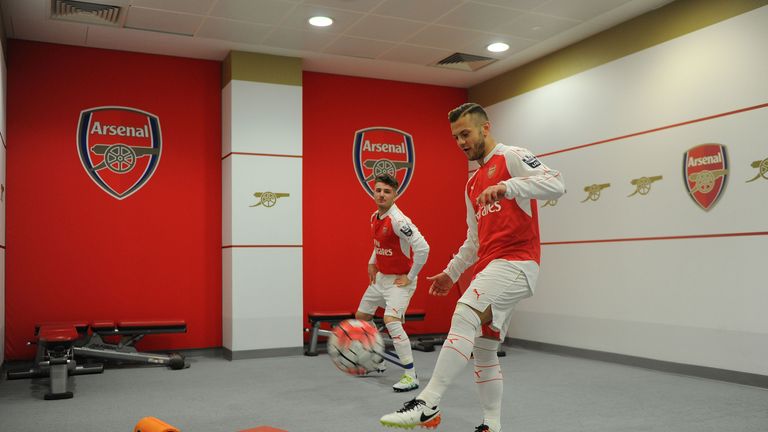 Wilshere and Dan Crowley warm up prior to kick off