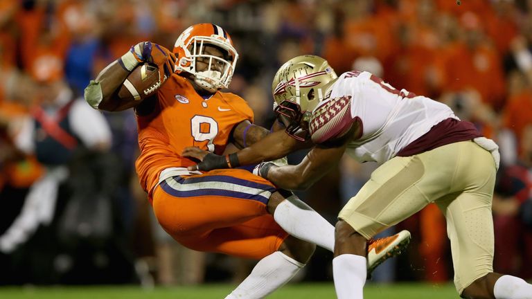 CLEMSON, SC - NOVEMBER 07:  Jalen Ramsey #8 of the Florida State Seminoles misses a tackle against Wayne Gallman #9 of the Clemson Tigers during their game