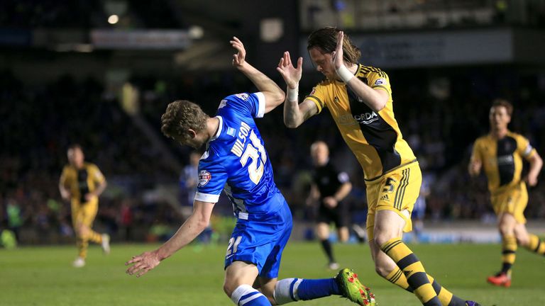 Brighton and Hove Albion's James Wilson is brought down in the box by Fulham's Richard Stearman (right) and is awarded a penalty during the Sky Bet Champio