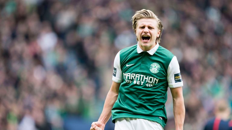 Hibernian's Jason Cummings celebrates after scoring the winning penalty 