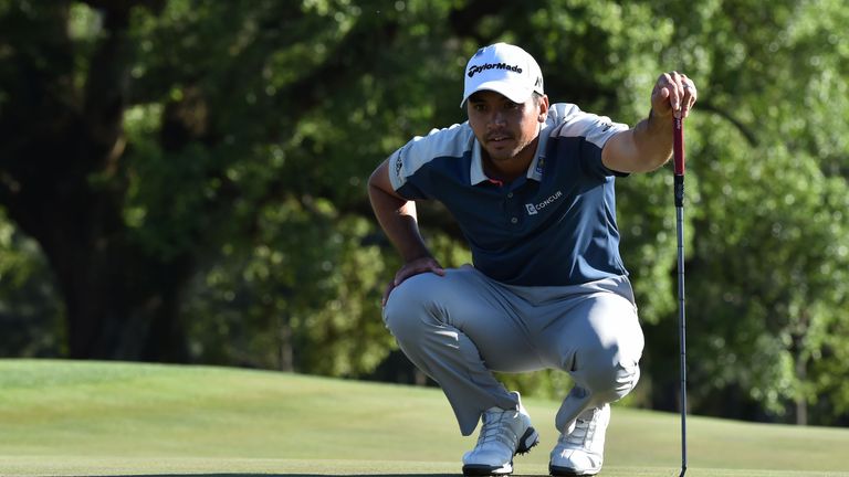 Jason Day holed a monster 70-foot putt at the 14th as he moved to level for the week