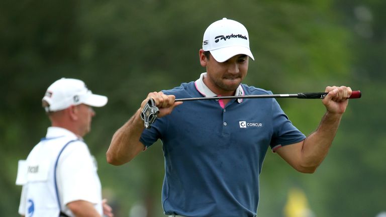 Jason Day of Australia reacts to his putt on the ninth hole during the first round of the Zurich Classic of New Orleans 