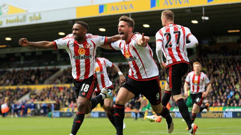 Jermain Defoe of Sunderland celebrates scoring his team's second goal with Fabio Borini