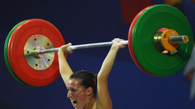 DELHI, INDIA - OCTOBER 05:  Jo Calvino of England competes in the Women's 53kg weightlifting final during day two of the Delhi 2010 Commonwealth Games at J