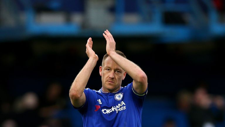 John Terry of Chelsea applauds the supporters after his team's 2-2 draw in the Premier League match against West Ham